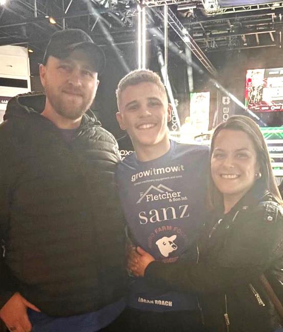 Mikey with proud parents